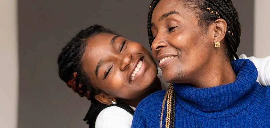 mother-and-daughter-smiling_mobile